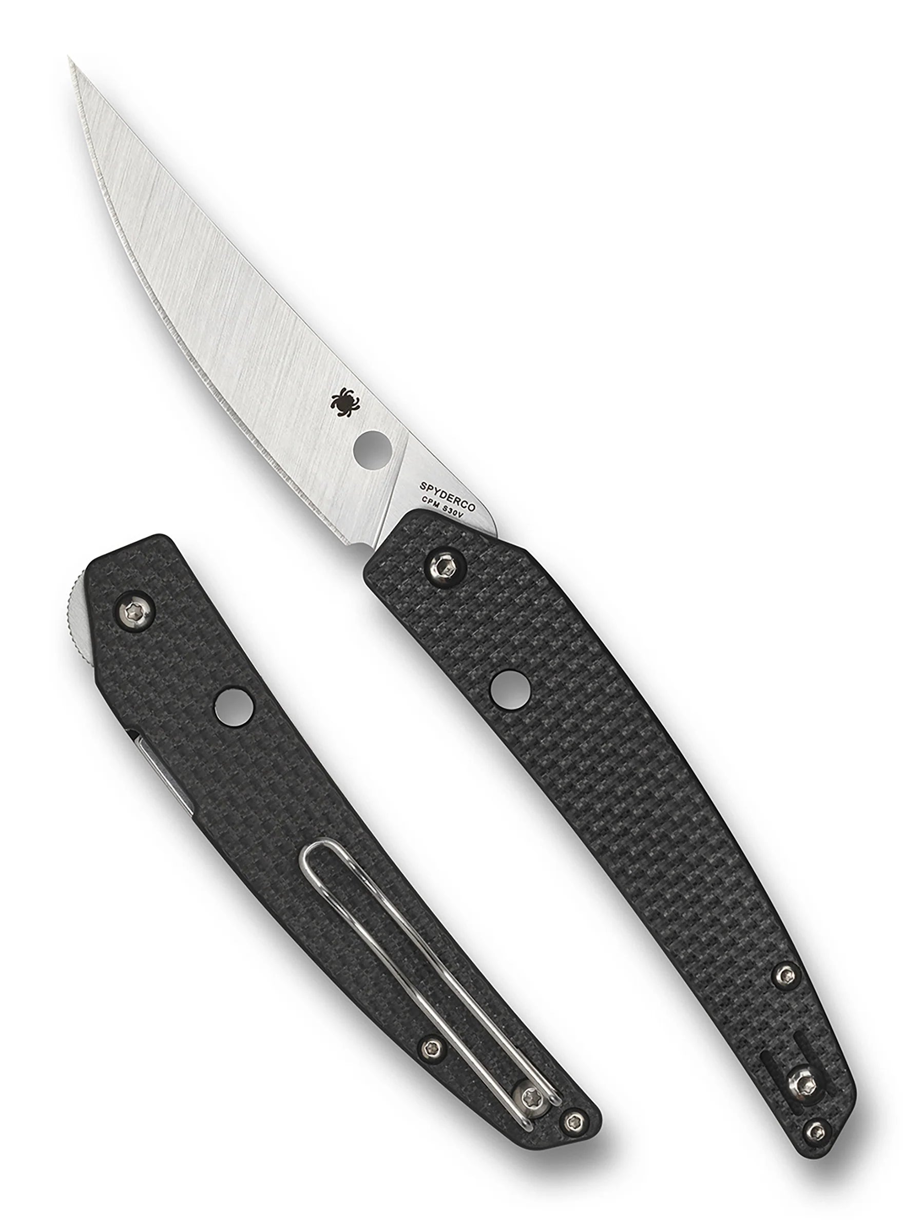 Spyderco Ikuchi Carbon Fiber pocket knife, shown open with a satin-finished drop-point blade featuring a round thumb-hole and logo; closed view highlights textured handle and wire pocket clip.