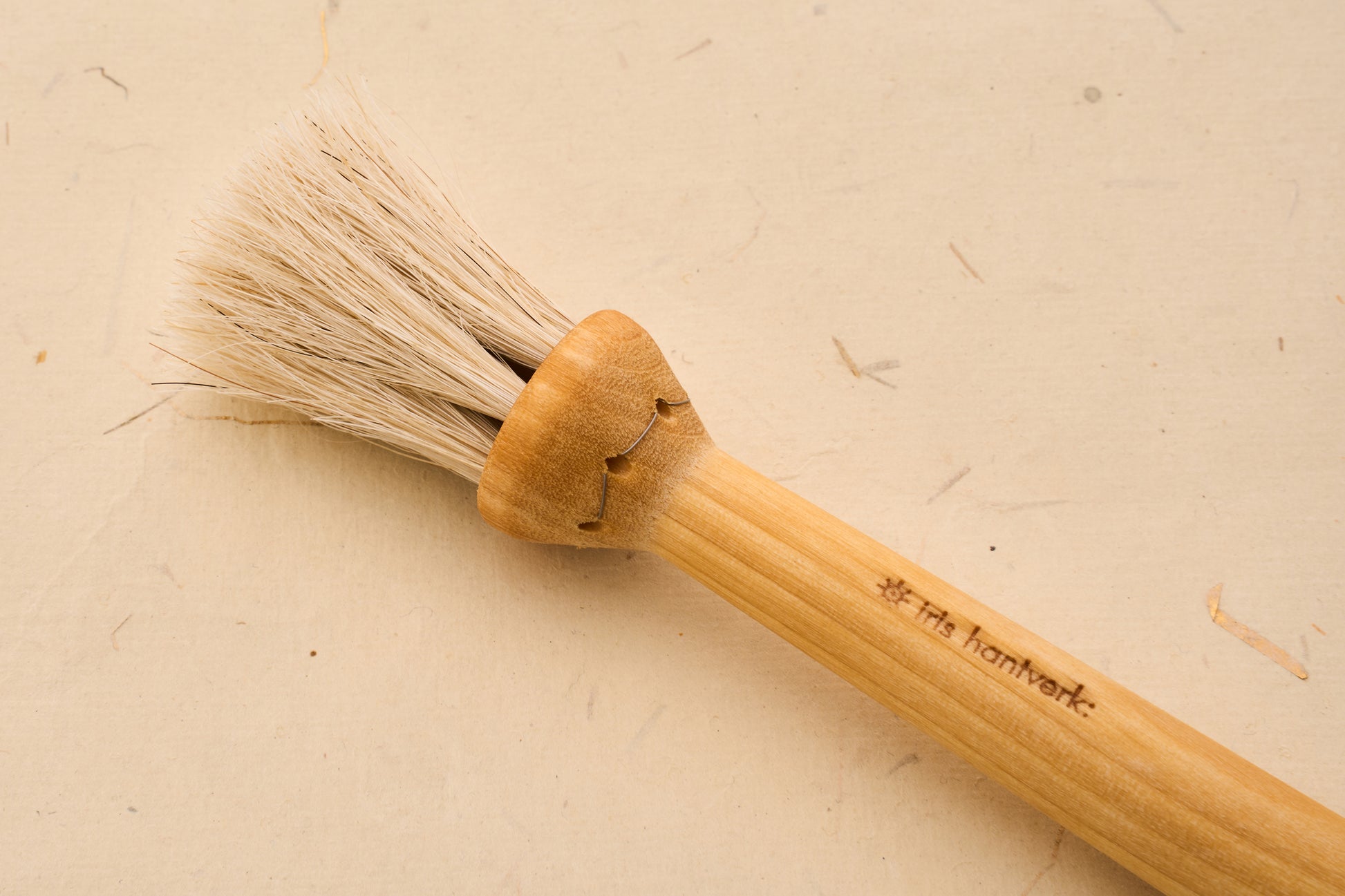 Iris Hantverk Round Pastry Brush with wooden handle and natural bristles, perfect for reaching intricate areas in baking, handmade by skilled craftsmen.