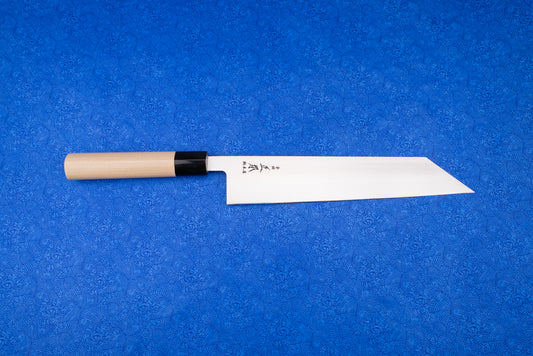 Masamoto MV Kiritsuke Gyuto 240mm, a Japanese-style kitchen knife with a long, straight-edged blade and sharp, angled tip, featuring a simple turned-wood handle, perfect for precise slicing and carving.