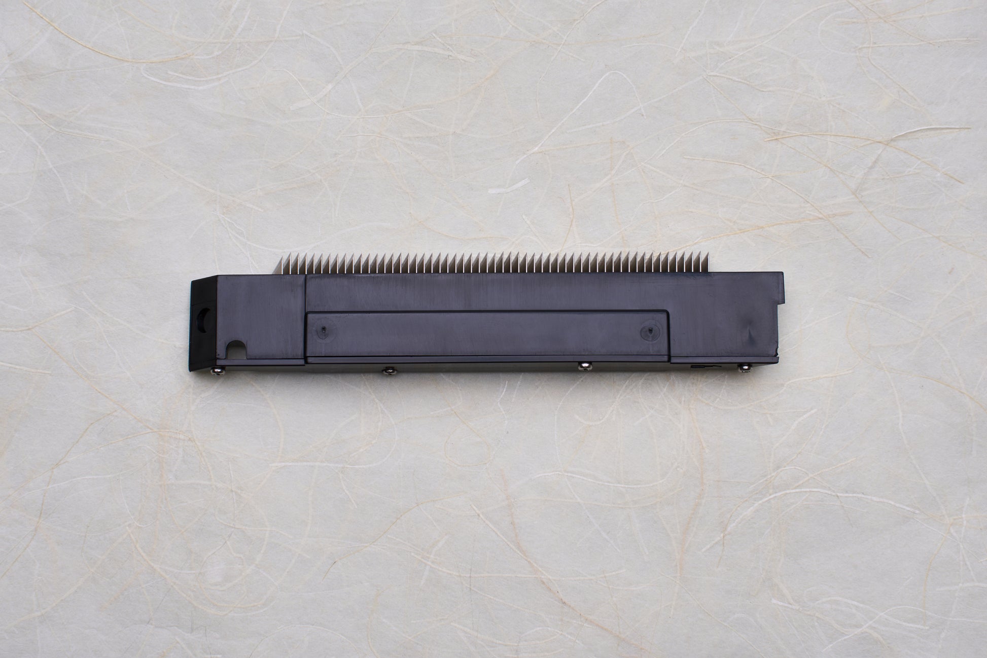 Replacement Blades for Chiba Mandoline Slicers, featuring a black module with aligned metal prongs, designed for seamless integration into precision kitchen slicing tools.