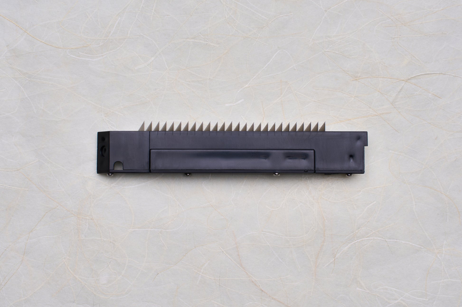 Replacement Blades for Chiba Mandoline Slicers, featuring a black module with triangular metal teeth, designed for precise slicing with Japanese kitchen expertise.