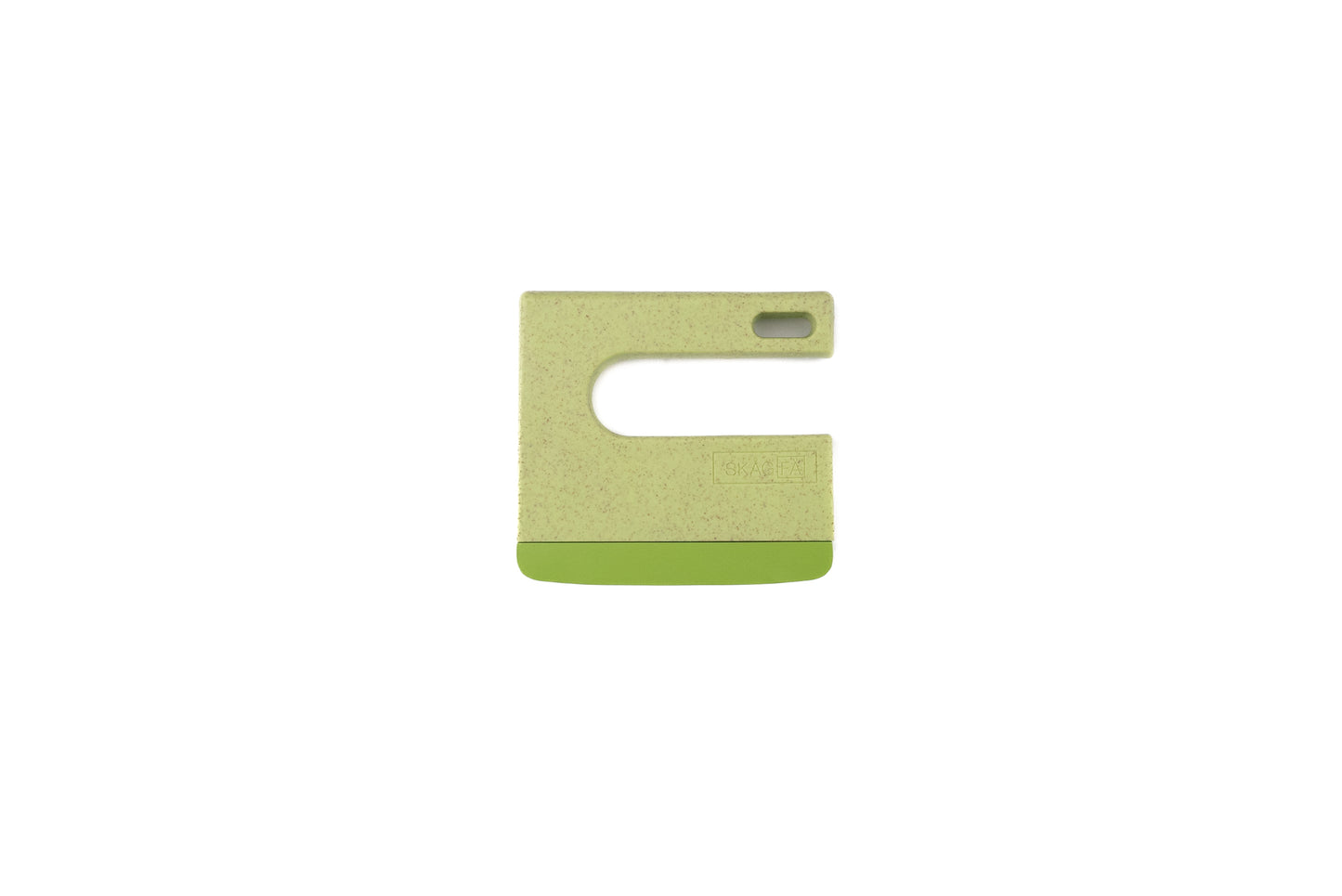 Skagfa Kid's Knife, a bioplastic kitchen tool with a curved silicone-edged blade, designed for safe food prep involvement for children. Ideal for teaching young chefs basic culinary skills.
