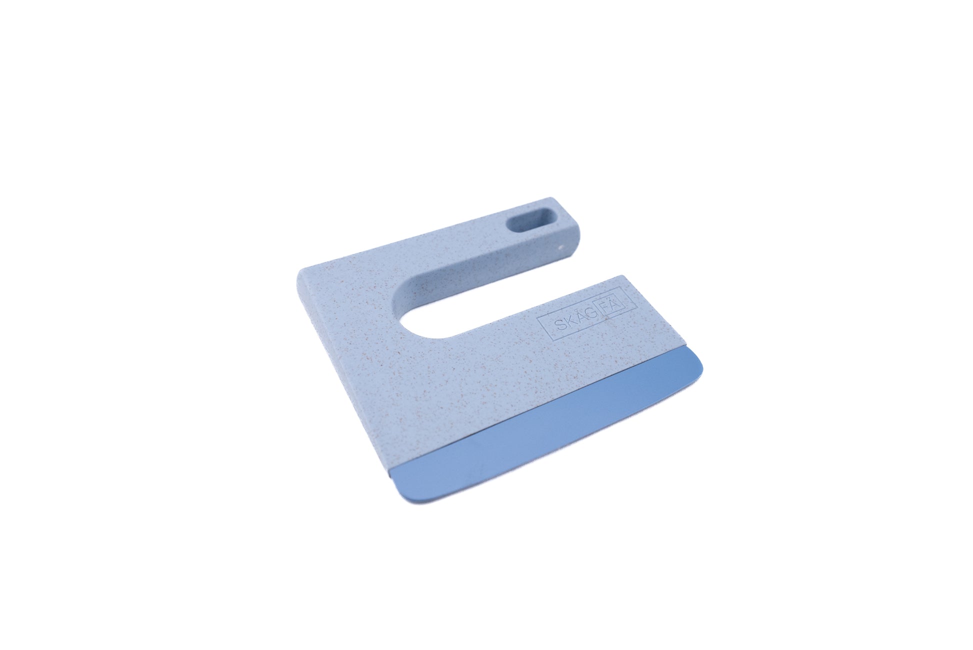 Skagfa Kid's Knife by SKAGFEA, a safe training tool for kids, features a single-piece plastic scraper design with an integrated handle, perfect for teaching young chefs essential kitchen skills.