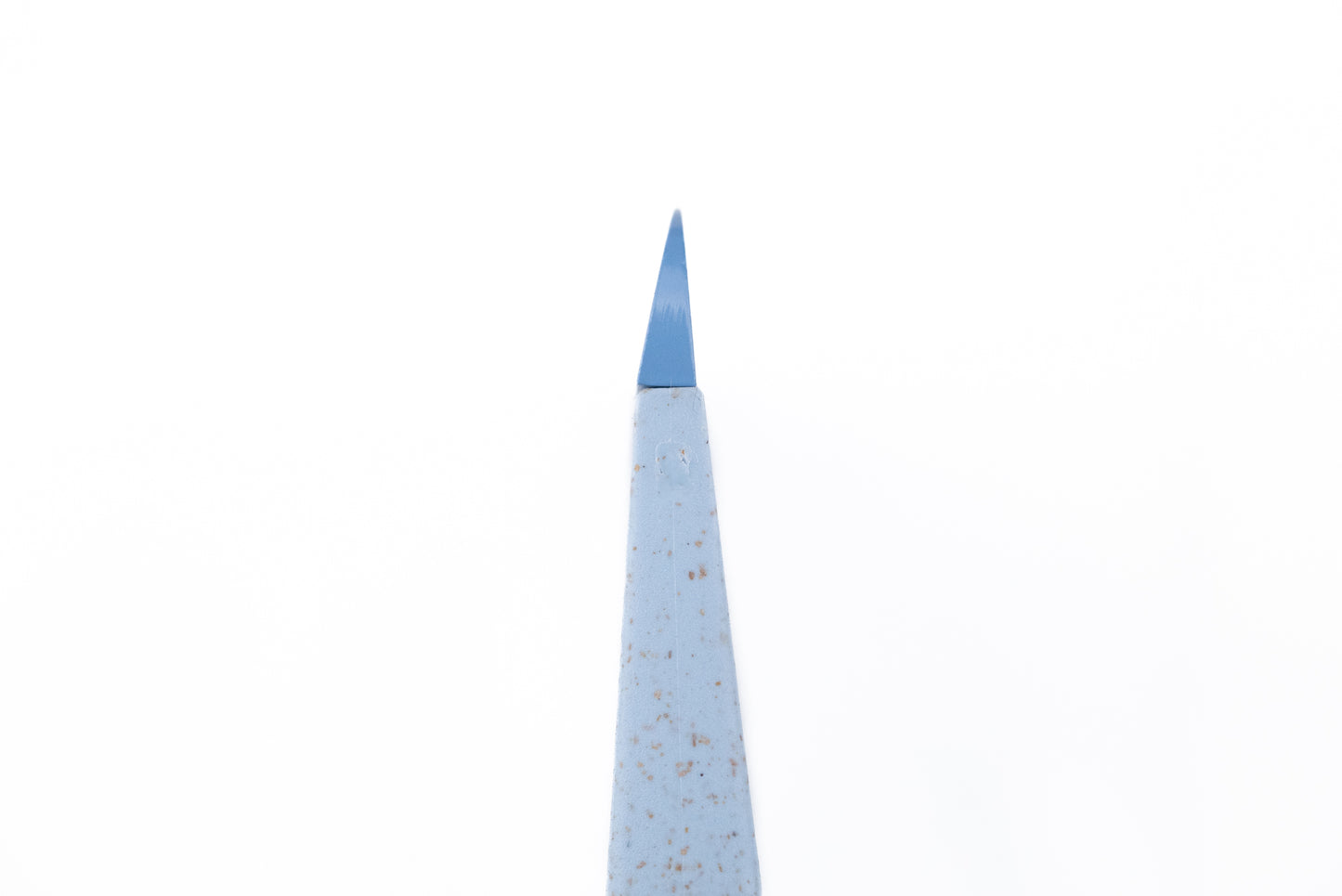 Skagfa Kid's Knife, a triangular-section bar with a dull blade, designed for safe food prep. Its wheat-based build is ideal for introducing children to cooking under supervision.