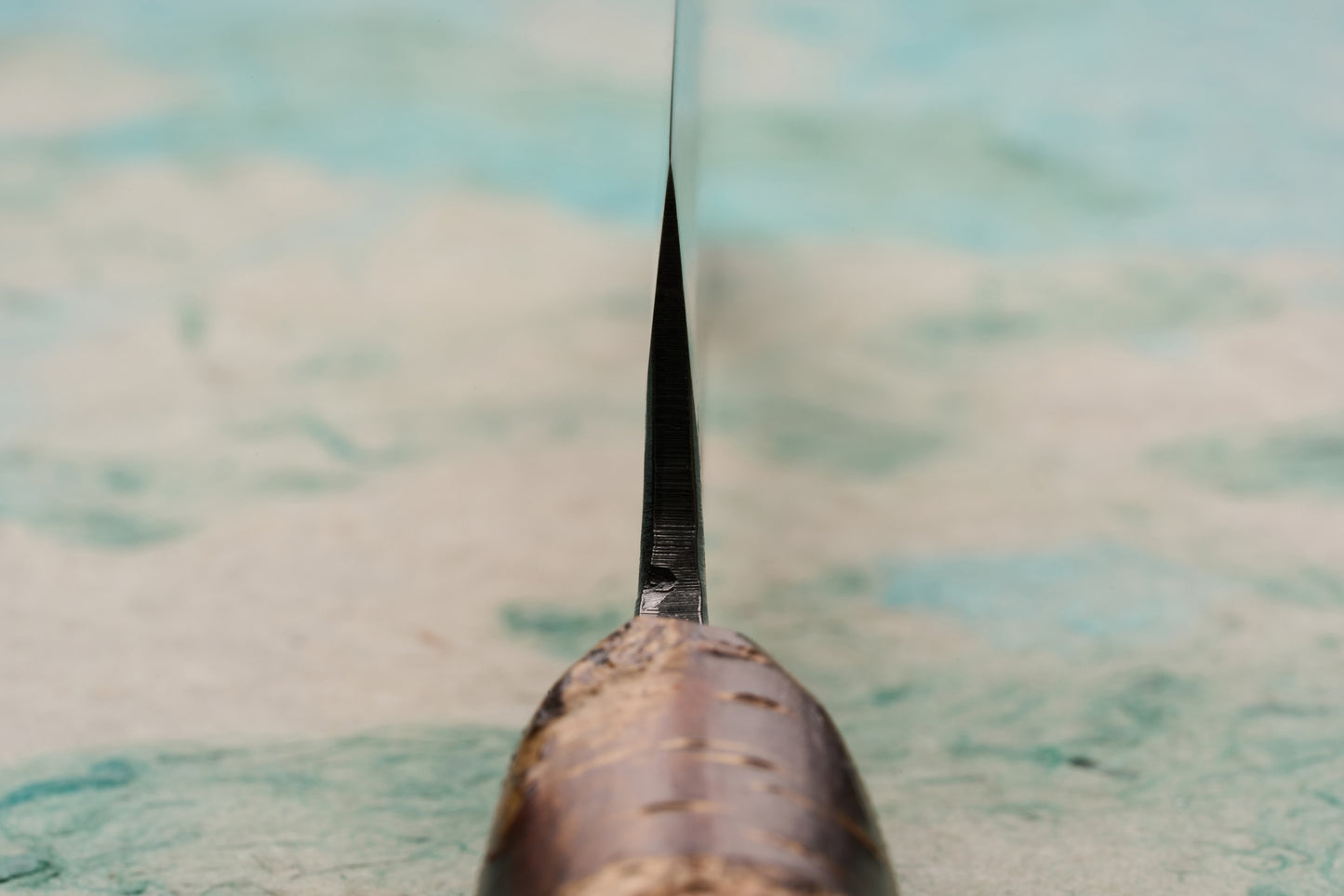 Tottori Otsuka Hamono Aoichi Table Knife 155mm, featuring a polished cherrywood handle and an elegantly thin, sharp Aogami #1 carbon steel blade, viewed from the spine down to the tip.
