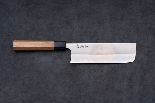 Yoshimi Kato AS/S Nashiji Nakiri 165mm knife with a stainless-steel blade, kanji engraving, and octagonal wooden handle on a dark surface.
