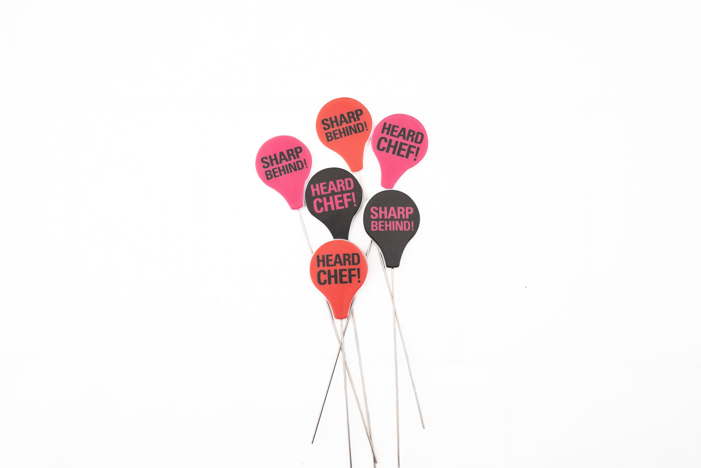 Knifewear Cake Tester: Six novelty kitchen markers shaped like balloons on metal rods, featuring humorous phrases ideal for chefs. Perfect for testing cake doneness or food temperature.